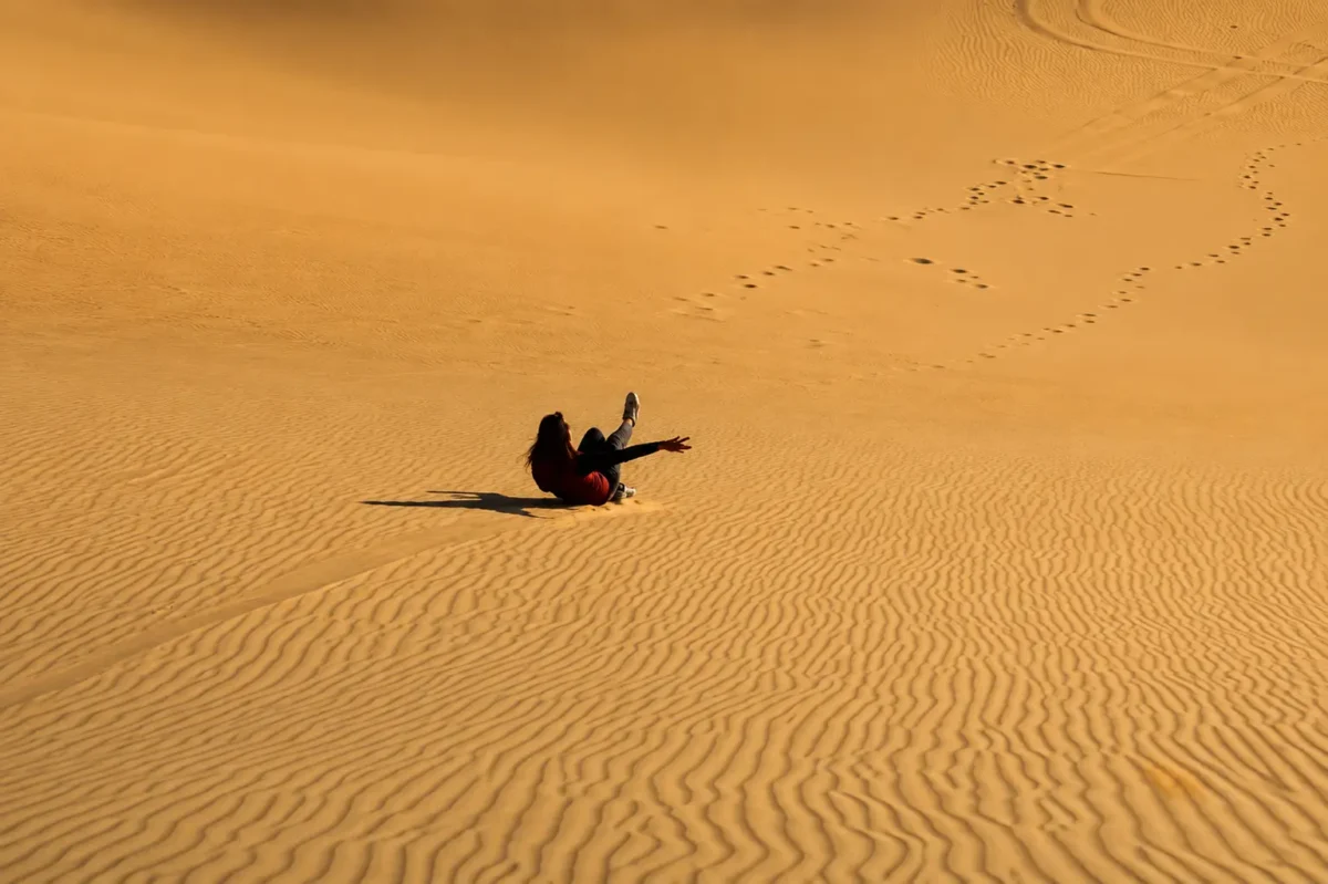 Things to do in Siwa Oasis - sandboarding on the dunes